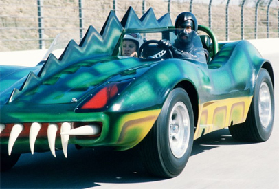 Death Race 2000 Car: "Double bonus: A biker pulling a child. Yummy..."